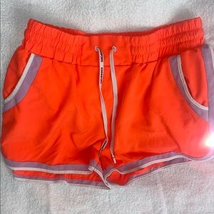 Orange Athletic Shorts with Elastic Waistband and Quick-Dry Fabric
